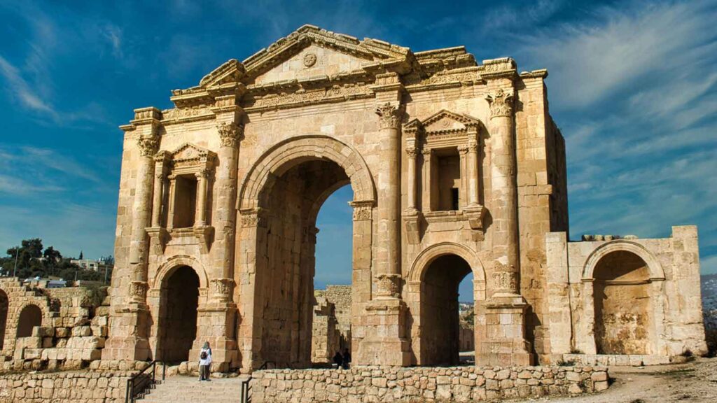 Hadrian's Gate ancient Roman marble triumphal arch from 130 AD with three arched entrances and detailed stone carvings