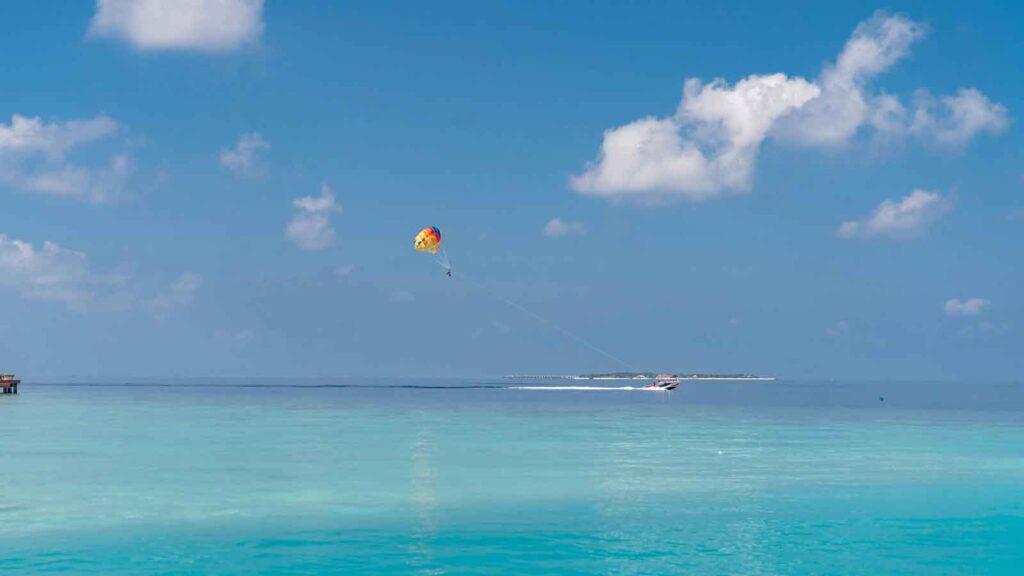Scuba divers exploring colorful Mediterranean reef and sea turtles in crystal-clear waters off Kas coast