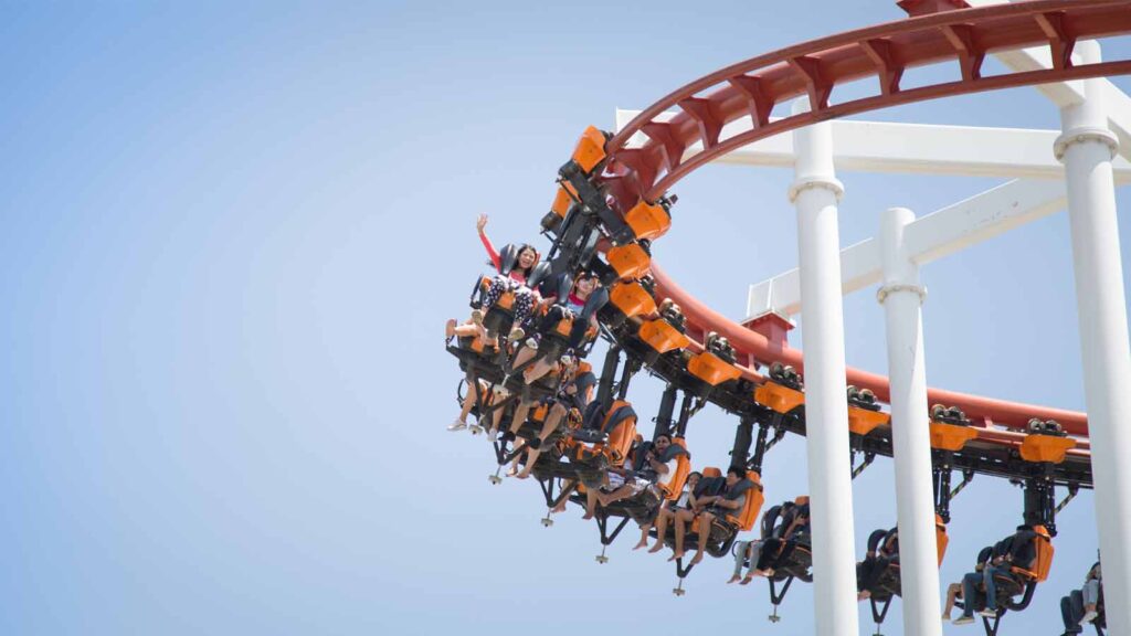 Land of Legends theme park with colorful water slides, lazy river, and castle architecture in Antalya