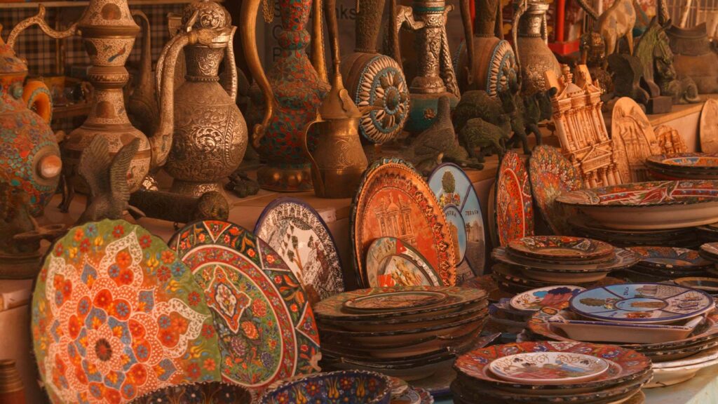 Artisan shop displaying hand-painted Turkish ceramics, decorative plates, and traditional pottery in Antalya market