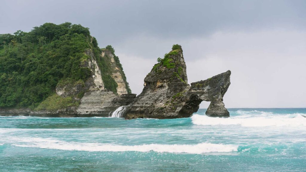 Stunning Bali landscape montage showing temples, beaches, rice terraces representing why to visit Bali