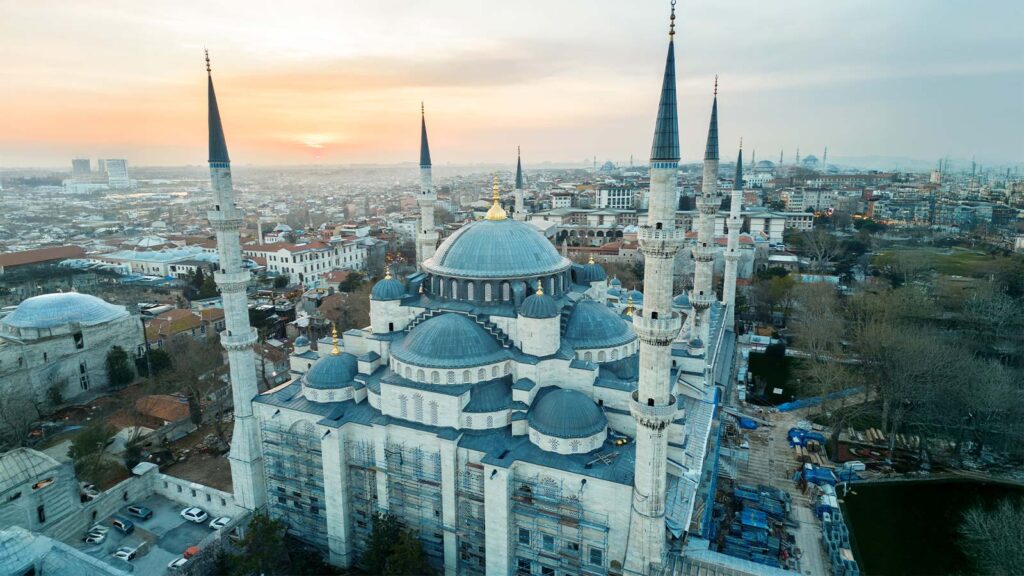 Blue Mosque courtyard view displaying all six minarets and central dome in Istanbul