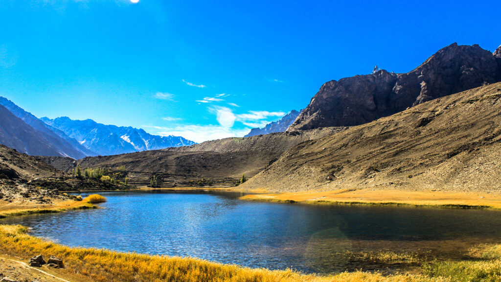 Serene Borith Lake near Gulmit village offering peaceful boating and excellent bird watching opportunities