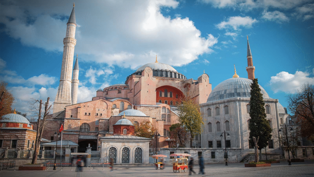 Hagia Sophia exterior with four minarets  against bright blue sunset sky in Istanbul