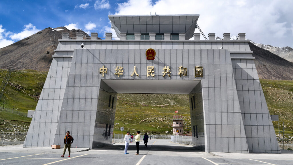 Khunjerab Pass border monument marking the highest paved international crossing between Pakistan and China
