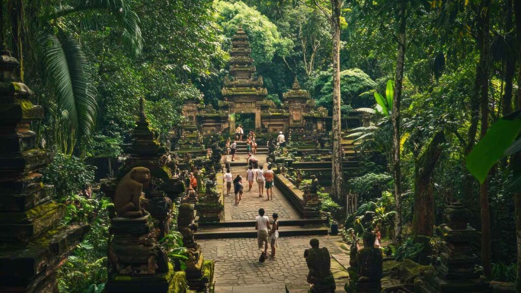 Traditional Ubud village center with Hindu temples, rice fields, and local markets showcasing Balinese culture
